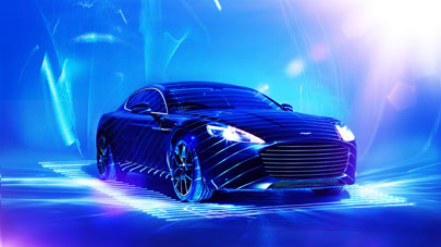 The new Rapide S, the world’s most beautiful four-door sports car, dazzles under laser beam lights, displaying its famed power, beauty and soul