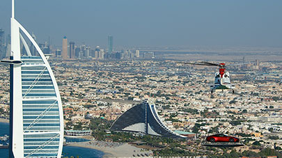 A Vanquish was spectacularly lifted onto the helipad at the Burj Al Arab hotel in Dubai