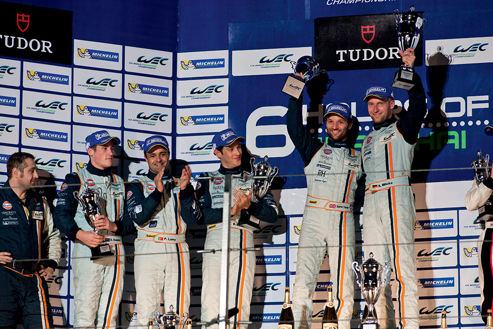 Aston Martin Racing dominates the podium in Shanghai as Darren Turner and Stefan Mcke lift their trophies.